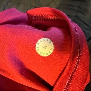 size 4 lulu leggings! super cute pink color!